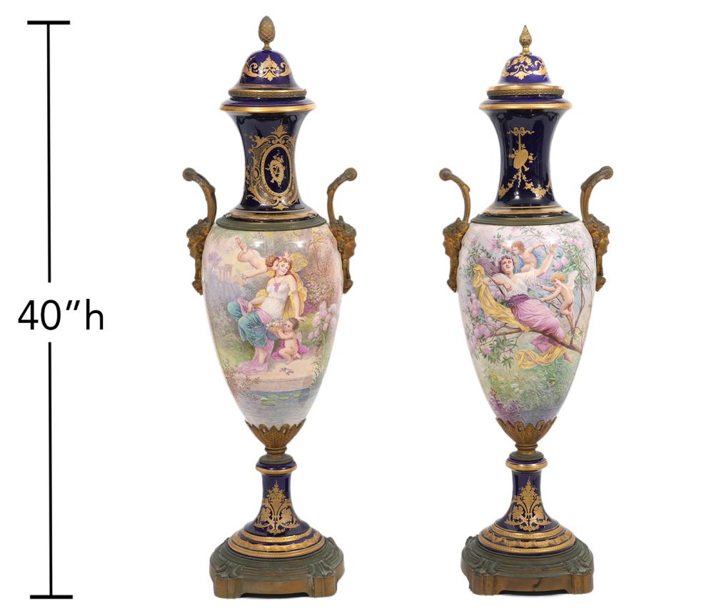 Appraisal: TWO LARGE BRONZE MOUNTED SEVRES URNSTwo large Sevres porcelain bronze