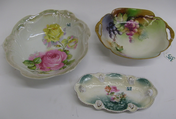 Appraisal: THREE CONTINENTAL PORCELAIN FLORAL DECORATED BOWLS The largest a Bavarian