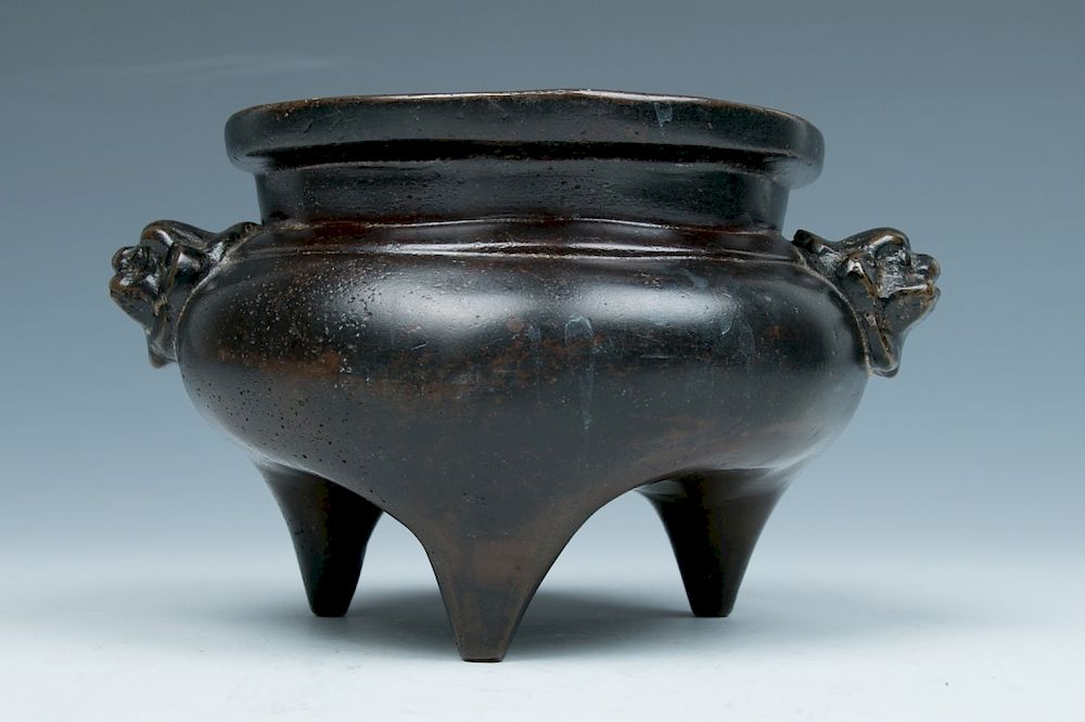 Appraisal: BRONZE DOUBLE EARS CENSER Of compressed globular body to a