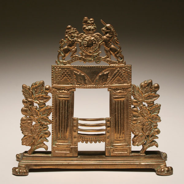 Appraisal: Victorian miniature solid brass fireplace with elaborate molded decoration Corinthian