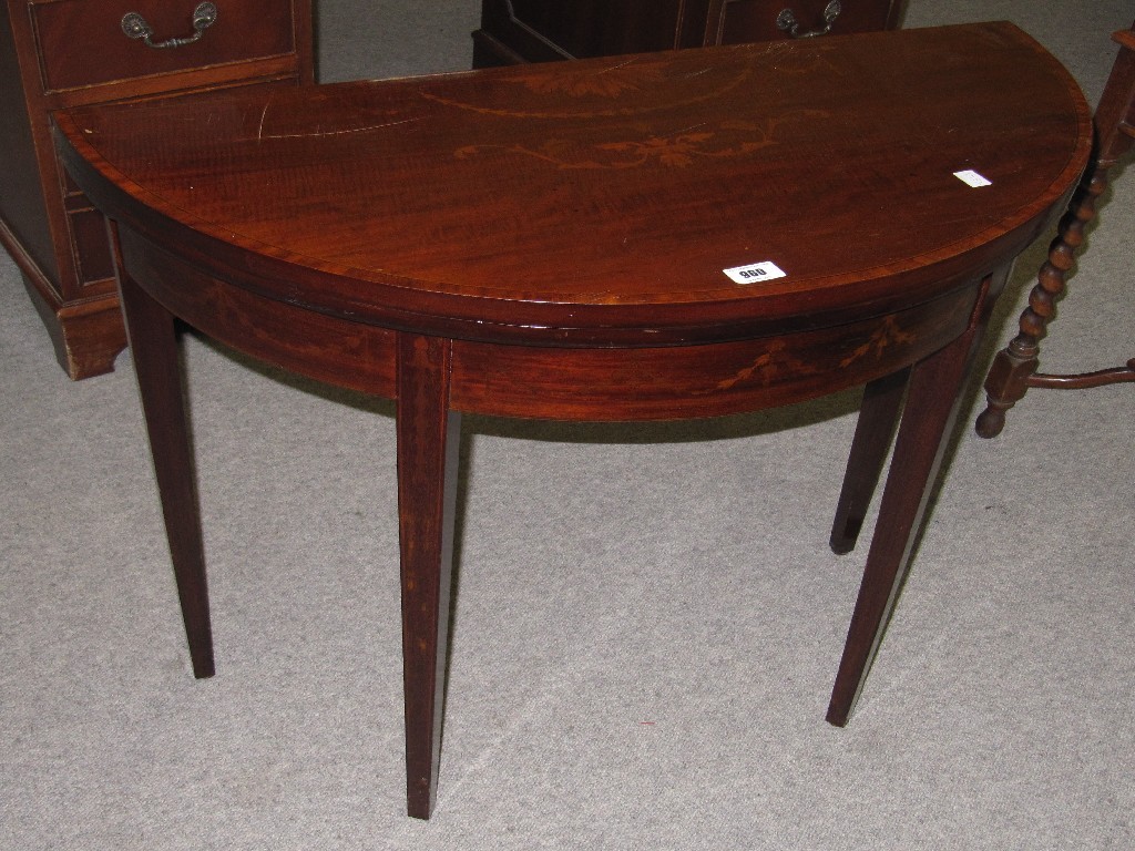 Appraisal: Mahogany inlaid turnover card table raised on tapering supports