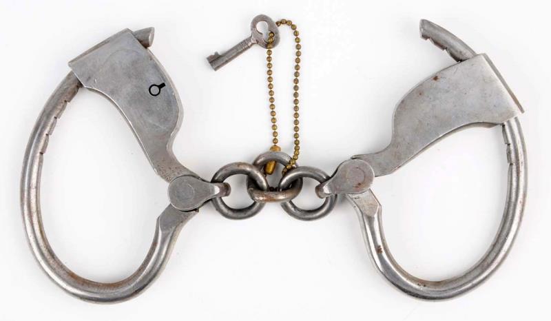 Appraisal: Towers Double Lock Handcuffs Comes with original key Last patent