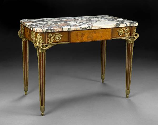 Appraisal: A Louis XVI style gilt bronze mounted and marquetry decorated