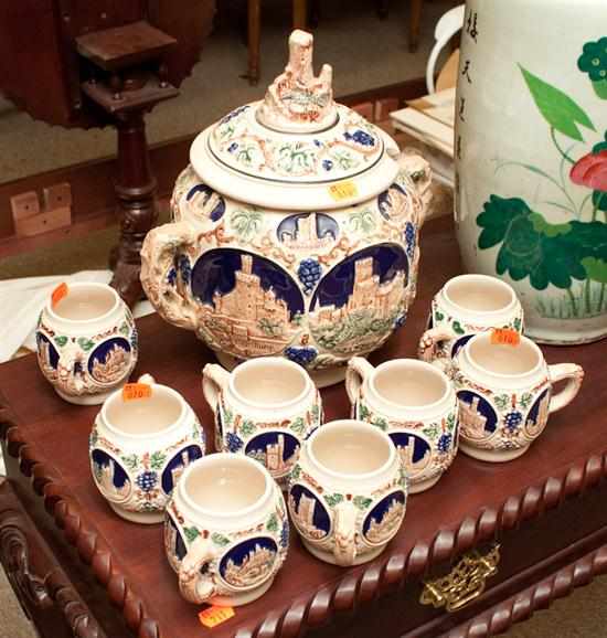 Appraisal: Gerz salt glazed stone carved punch tureen with eight mugs