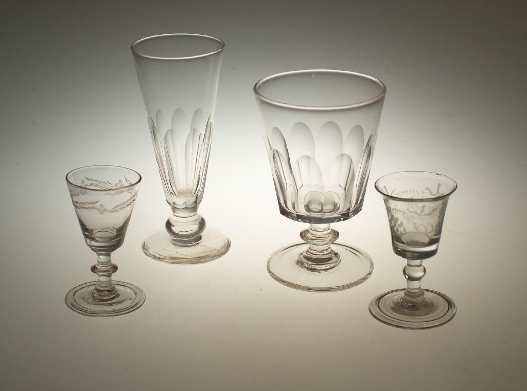 Appraisal: FOUR th th CENTURY DRINKING GLASSES comprising a panel-cut rummer