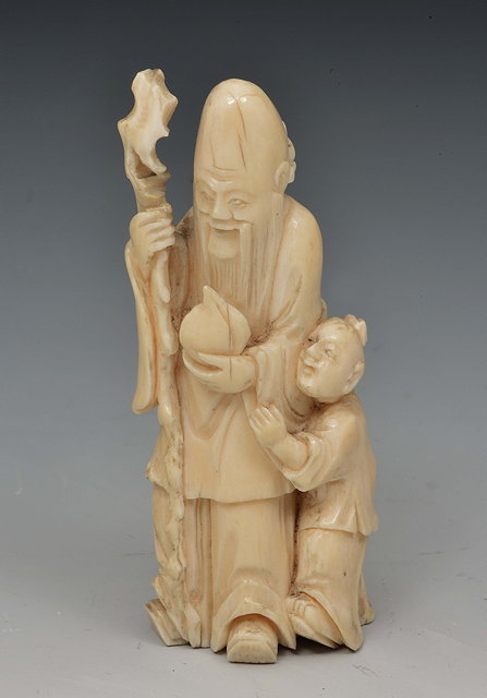 Appraisal: A Chinese ivory figure Lao Tszelate th Centurythe standing figure