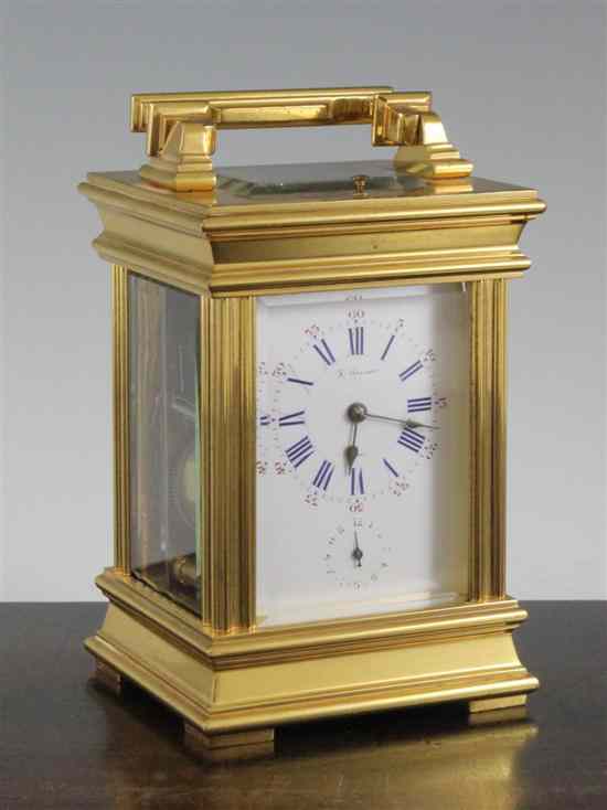 Appraisal: An Edwardian gilt brass hour repeating carriage alarm clock with