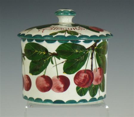 Appraisal: A Wemyss pottery biscuit barrel and cover decorated with cherries