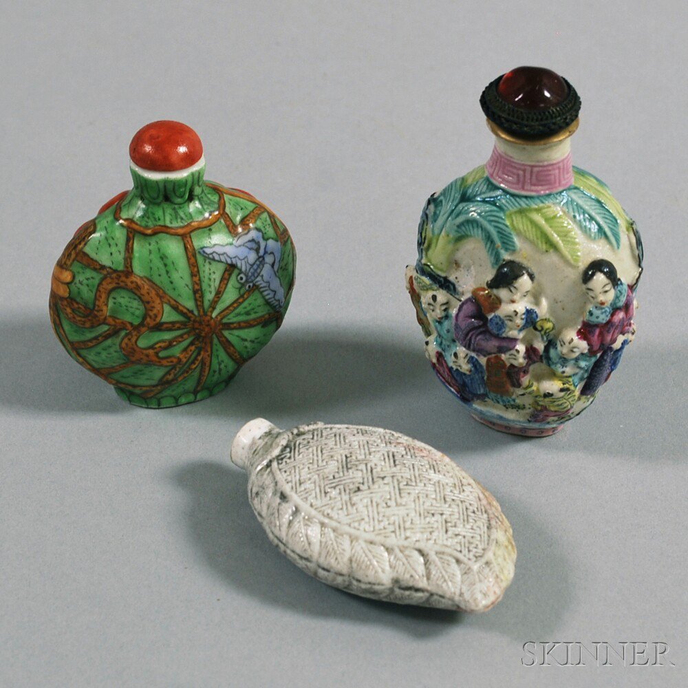 Appraisal: Three Porcelain Snuff Bottles China one decorated with painted figures