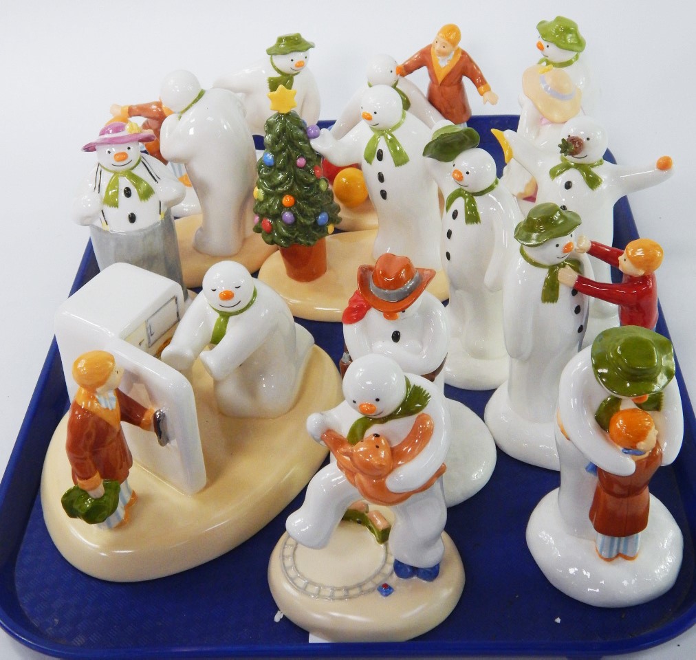 Appraisal: Coalport Snowman porcelain figures all boxed comprising The Hug Adding