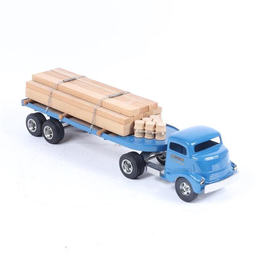 Appraisal: SMITH MILLER PRESSED STEEL TOY LUMBER TRUCK WITH BLUE CAB