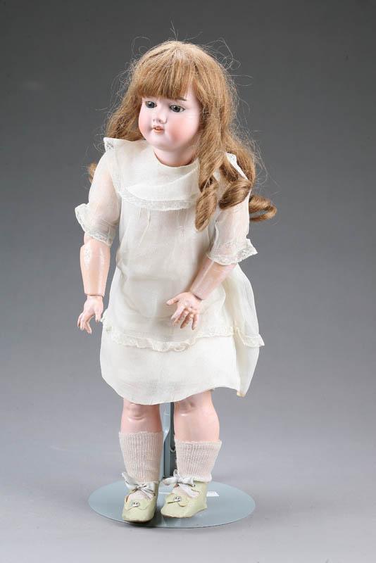 Appraisal: DOLL Bisque head sleep eyes and open mouth with four