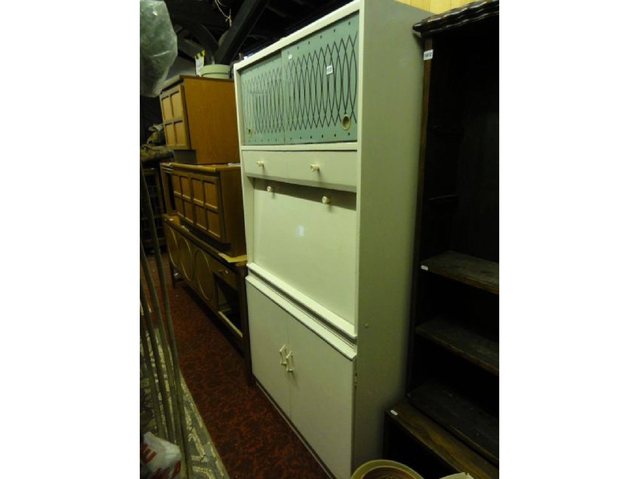 Appraisal: A vintage Remploy freestanding kitchen cabinet enclosed by an arrangement