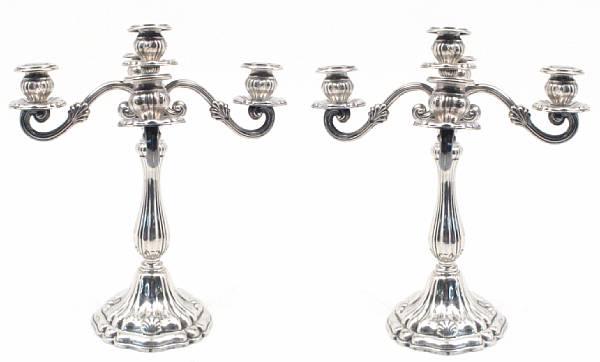 Appraisal: A Peruvian pair of sterling four arm five light candelabraMaker's