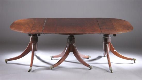 Appraisal: ENGLISH REGENCY-STYLE THREE-PEDESTAL DINING TABLE Late th century Center tilt-top