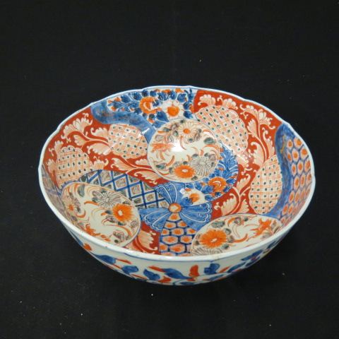 Appraisal: Oriental Imari Porcelain Bowl pinwheel medallion style florals hairlined