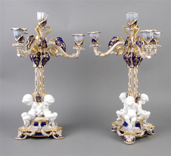 Appraisal: A Pair of English Figural Four-Light Candelabra Copeland Height inches