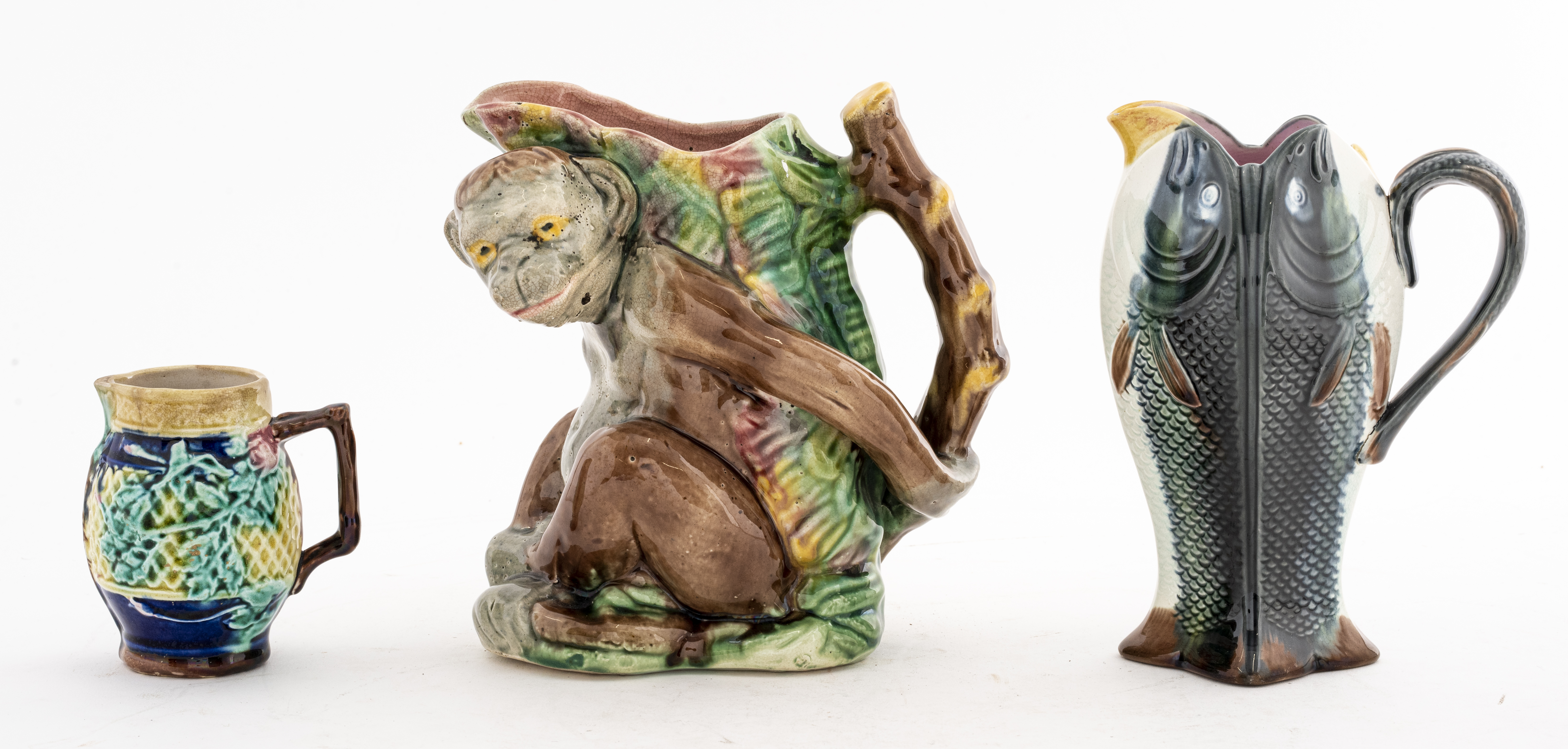 Appraisal: ENGLISH VICTORIAN MAJOLICA PITCHERS English Victorian set of three majolica