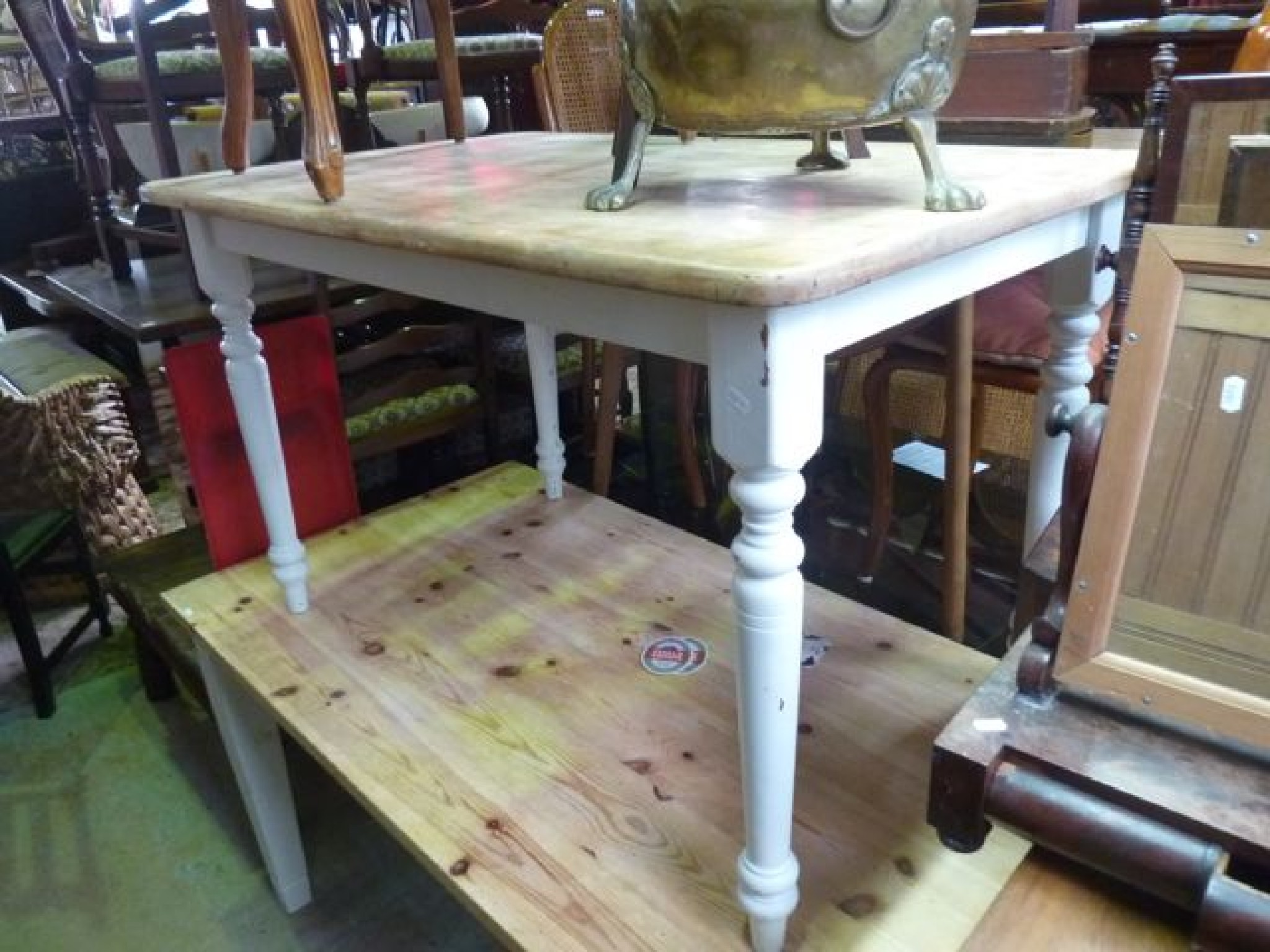 Appraisal: A kitchen table the rectangular stripped beechwood top with rounded