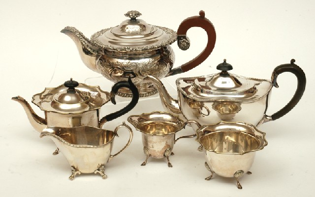 Appraisal: A COLLECTION OF EP HOLLOWWARE Including three tea pots two