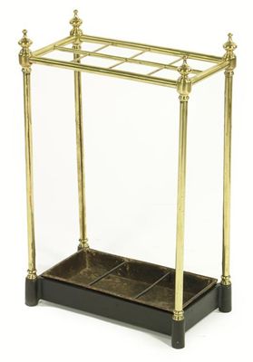 Appraisal: A turned brass and cast iron stick stand with eight