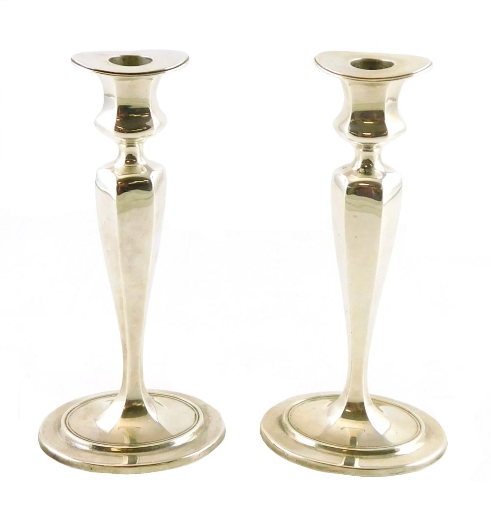 Appraisal: STERLING Tiffany and Co sterling candlesticks pair American c pattern