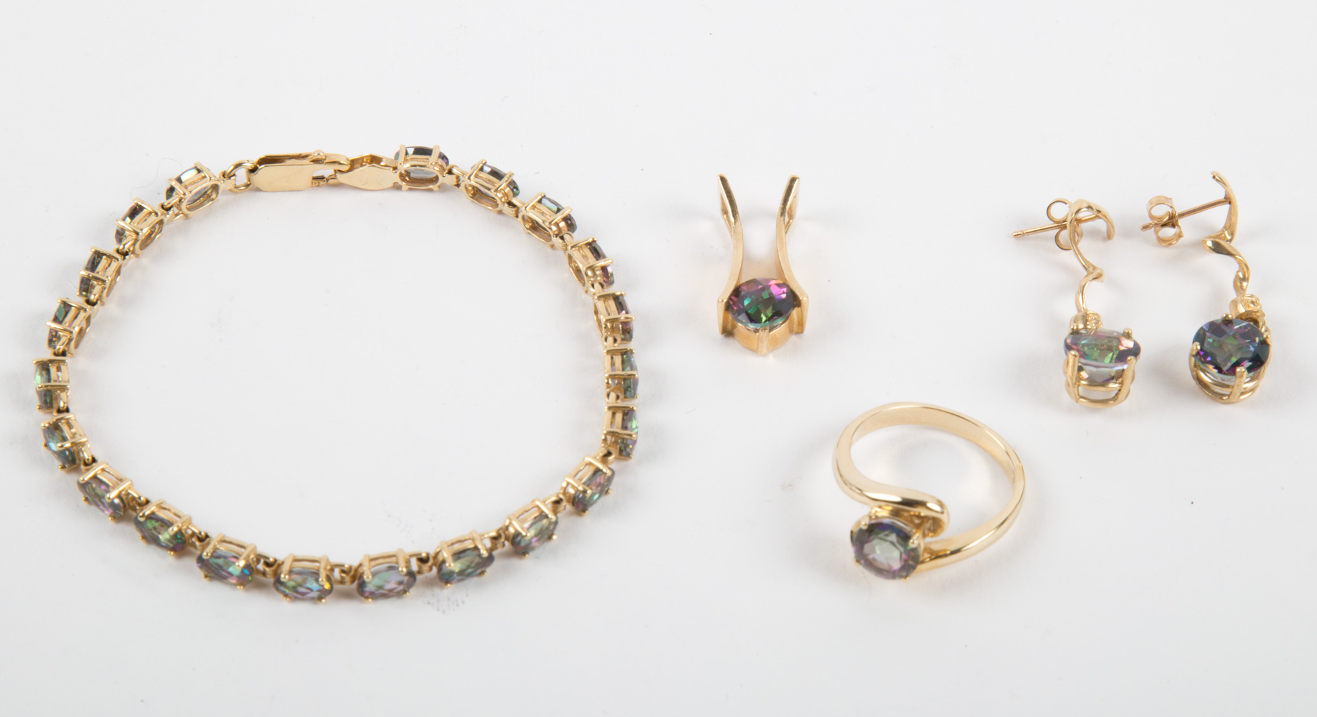 Appraisal: A Rainbow Topaz Suite k including ring earrings bracelet and