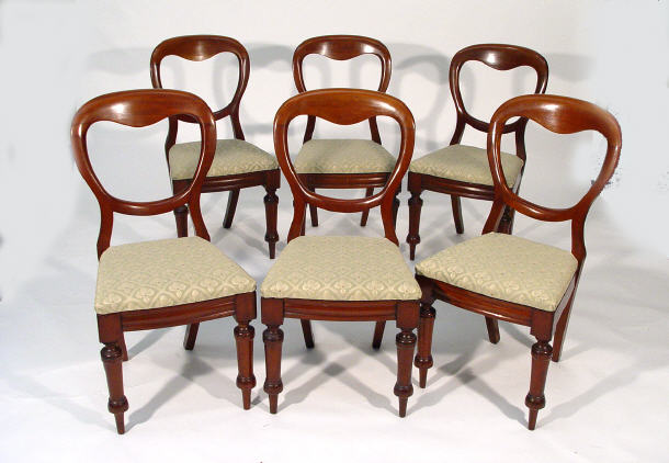 Appraisal: Set of six Victorian balloon back dining chairs with stuff-over