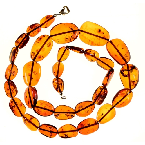 Appraisal: A necklace or irregular amber beads g More Information Good