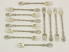 Appraisal: FORKS - Set of twelve sterling seafood forks in Radiant