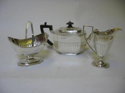 Appraisal: A VICTORIAN THREE PIECE TEA SERVICE by Th Bradbury Sons