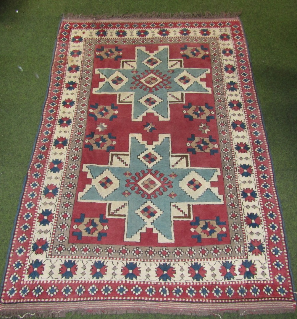 Appraisal: An early thC rectangular Middle Eastern rug with a geometric