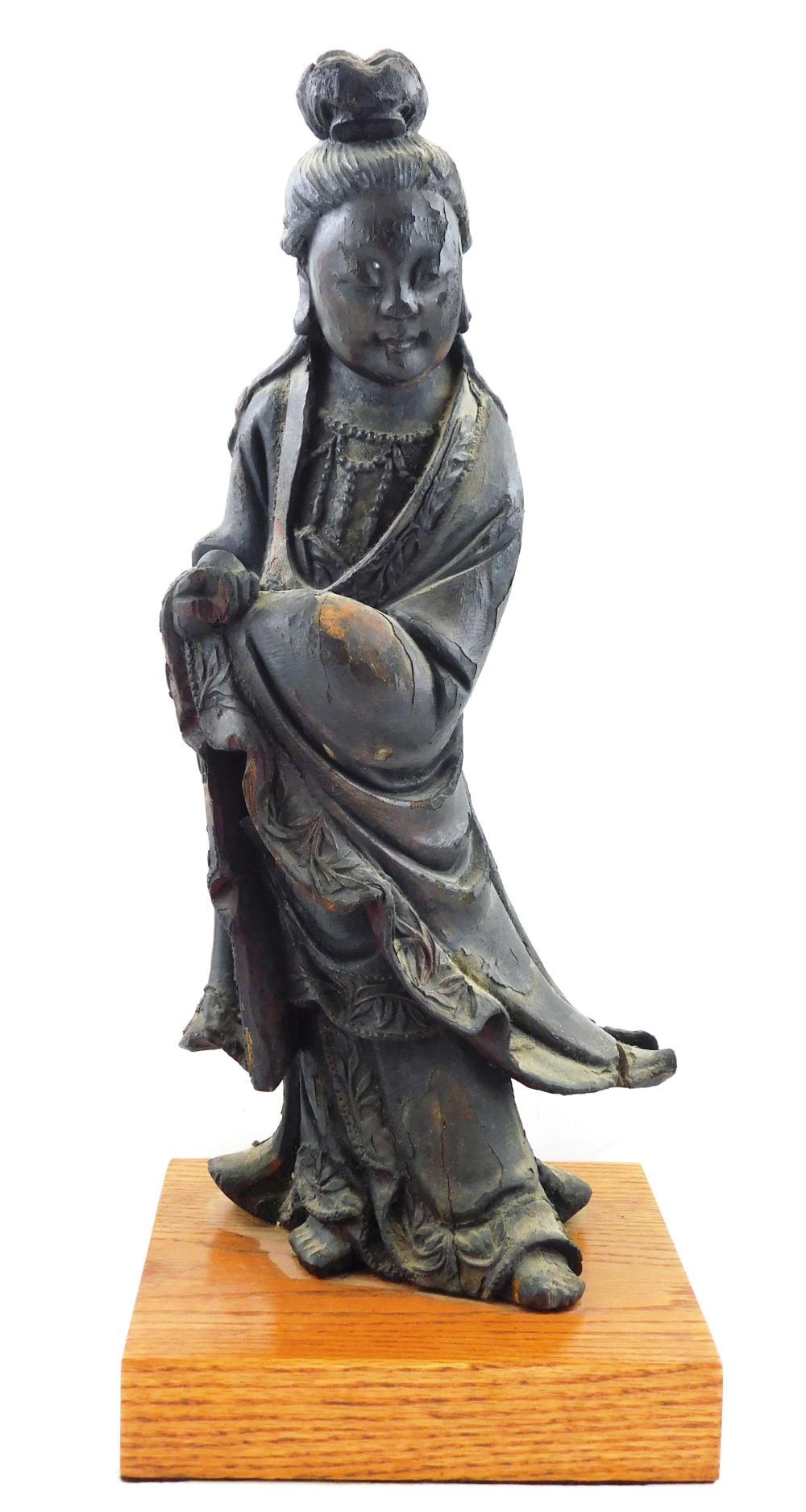 Appraisal: ASIAN Chinese wood and lacquer figure of Guanyin probably Qing