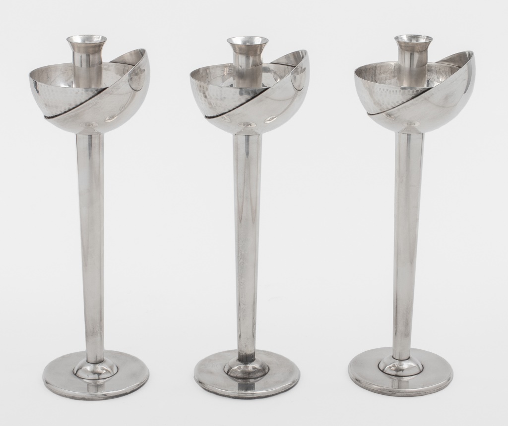 Appraisal: SWID POWELL SILVERPLATED CANDLESTICKS Postmodern Swid Powell silverplated candlesticks made