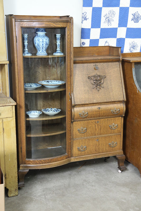 Appraisal: SIDE-BY-SIDE BOOKCASE Oak having a curved glass door on the