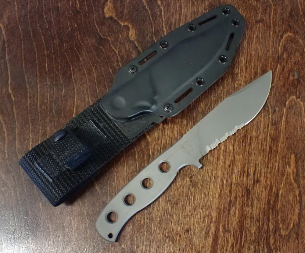 Appraisal: MISSION MPS KNIFE having half serrated blade matte gray finish