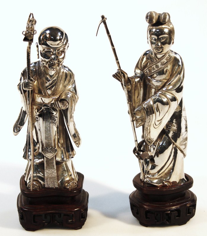 Appraisal: A pair of thC Chinese figures the first a sage