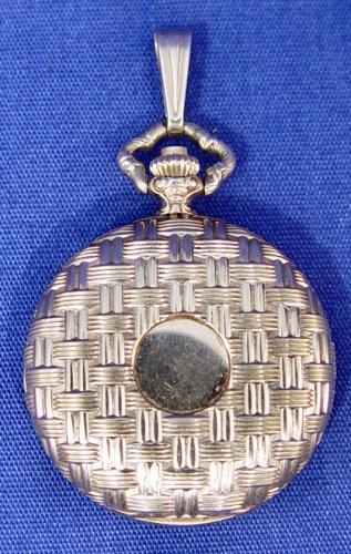 Appraisal: LADIES EUROPEAN K POCKET WATCH Basketweave design to outside of