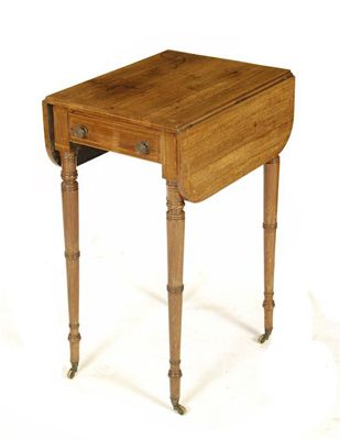 Appraisal: A Regency rosewood work table inlaid stringing the drop-leaf top