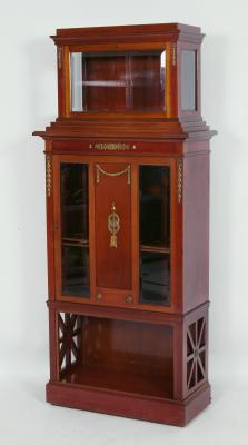 Appraisal: A FRENCH SECOND EMPIRE MAHOGANY LIBRARY CABINET of oblong form