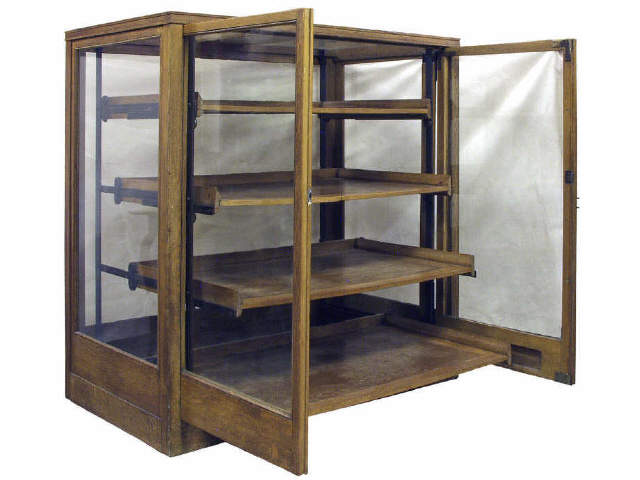 Appraisal: Fantastic circa - long oak display case featuring three pull