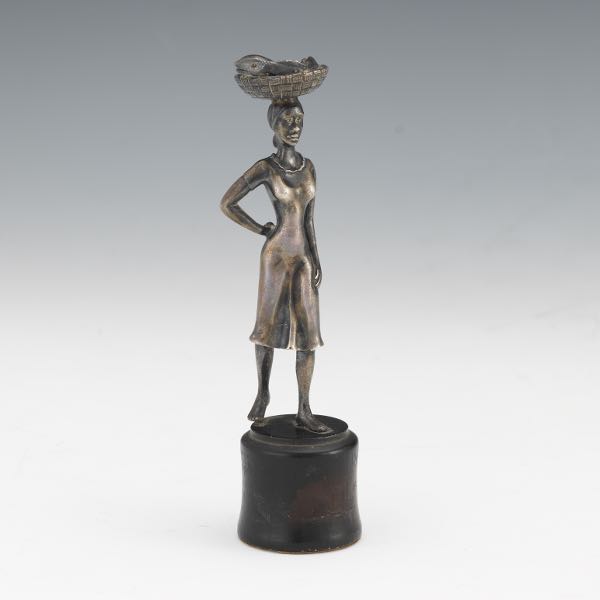 Appraisal: STERLING SILVER JAMAICAN WOMAN CABINET SCULPTURE Fully cast sterling silver