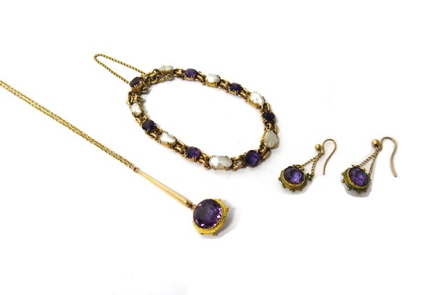 Appraisal: A gold amethyst and blister pearl set bracelet on a