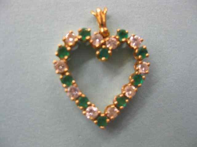 Appraisal: Emerald Diamond Heart Pendant emeralds and diamonds totaling carat in