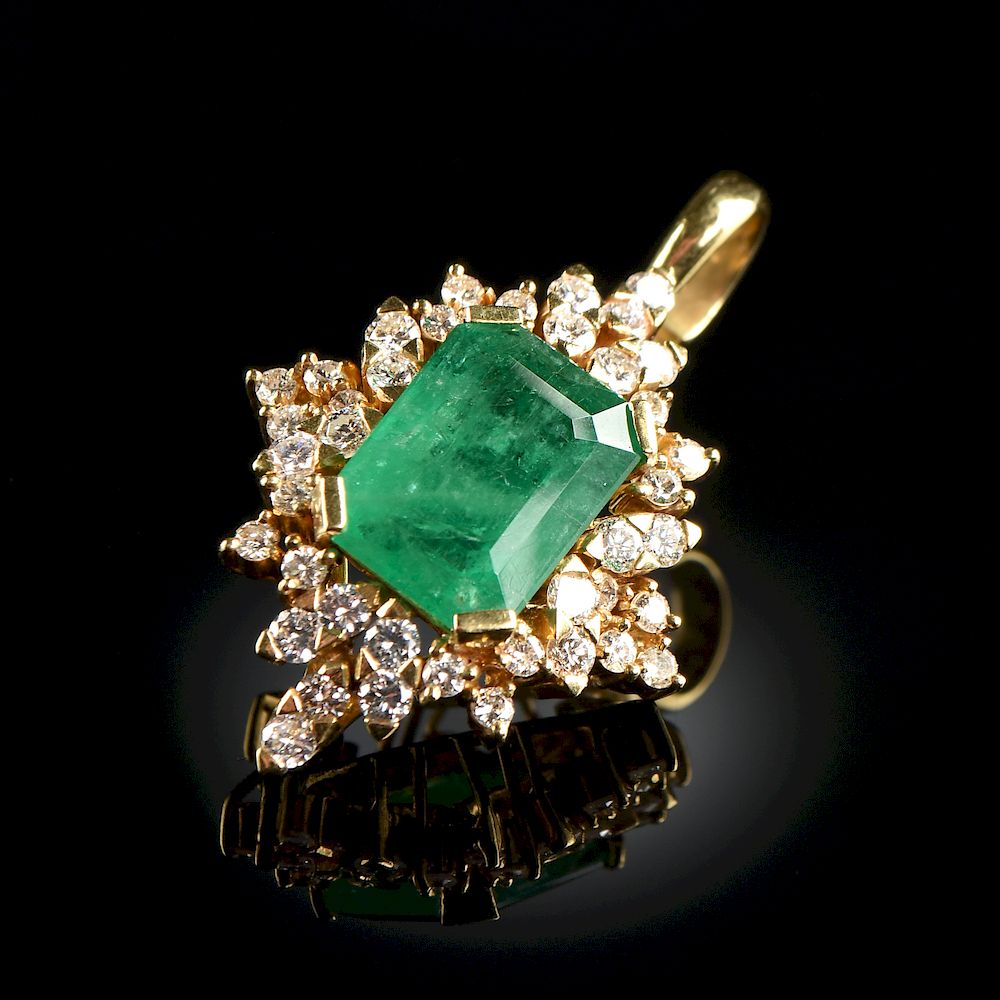 Appraisal: AN K YELLOW GOLD EMERALD AND DIAMOND LADY'S PENDANT AN