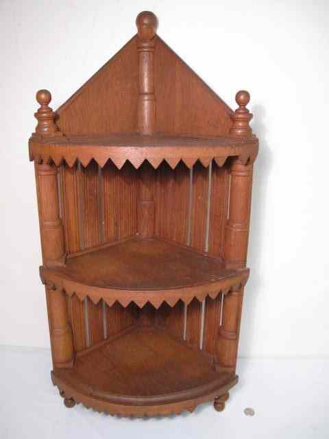 Appraisal: Antique Eastlake style corner shelf Wooden construction Three tiered shelf