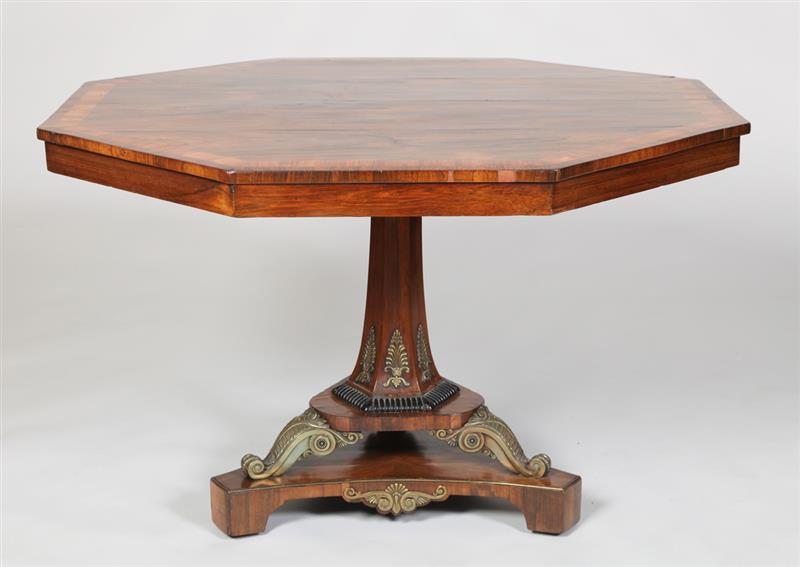 Appraisal: REGENCY BRASS-MOUNTED CALAMANDER AND WALNUT INLAID CENTER TABLE The octagonal-shaped