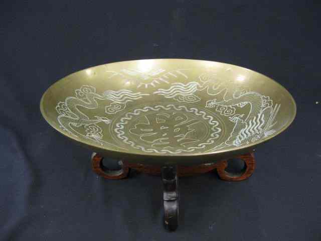 Appraisal: Chinese Brass Bowl dragon decor on wooden stand '' diameter