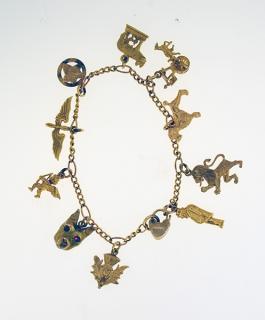 Appraisal: Gold Charm Bracelet gold charm bracelet Ten charms of mixed