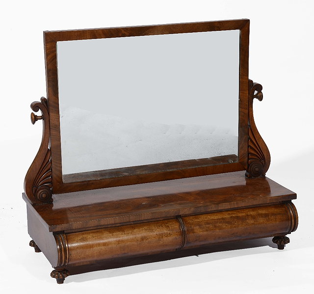 Appraisal: A th Century mahogany toilet mirrorwith two curved drawers to